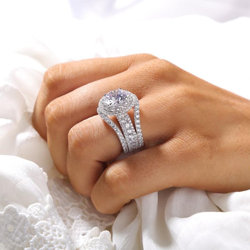Round Cut Halo Engagement Ring in Sterling Silver with Guard Enhancer