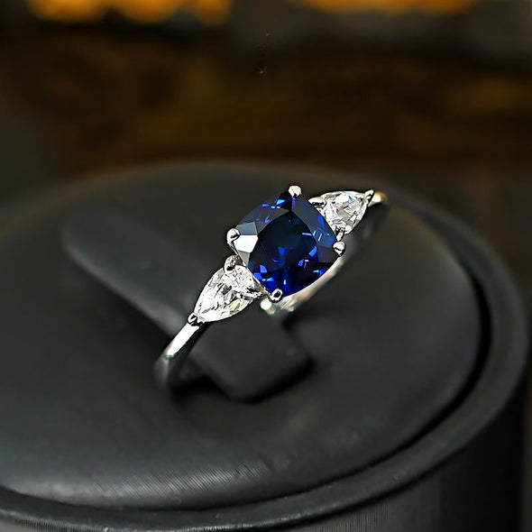 Three Stone Blue Cushion Cut Sterling Silver Engagement Ring