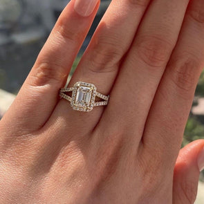 Luxurious Golden Tone Halo Emerald Cut Split Shank Engagement Ring