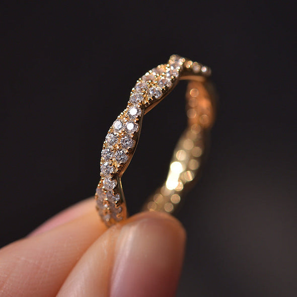 Elegant Pave Twist Eternity Wedding Band In Sterling Silver