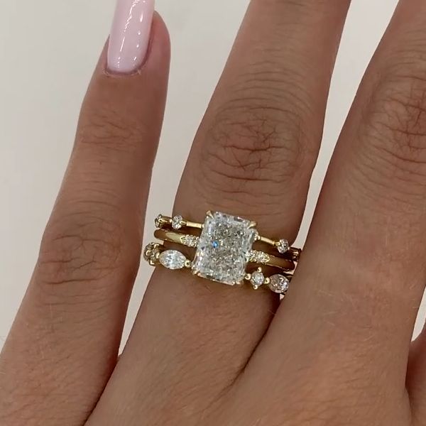 Radiant Cut Sterling Silver Ring Set with Round & Marquise Design