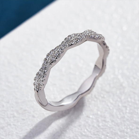 Elegant Pave Twist Eternity Wedding Band In Sterling Silver