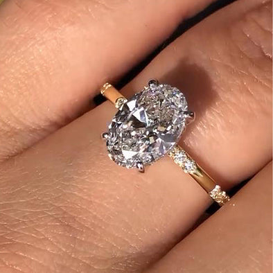 Gold Tone Oval Cut Unique Band Engagement Ring In Sterling Silver