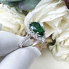 Elegant 2.2ct Emerald Green pear cut Engagement Ring