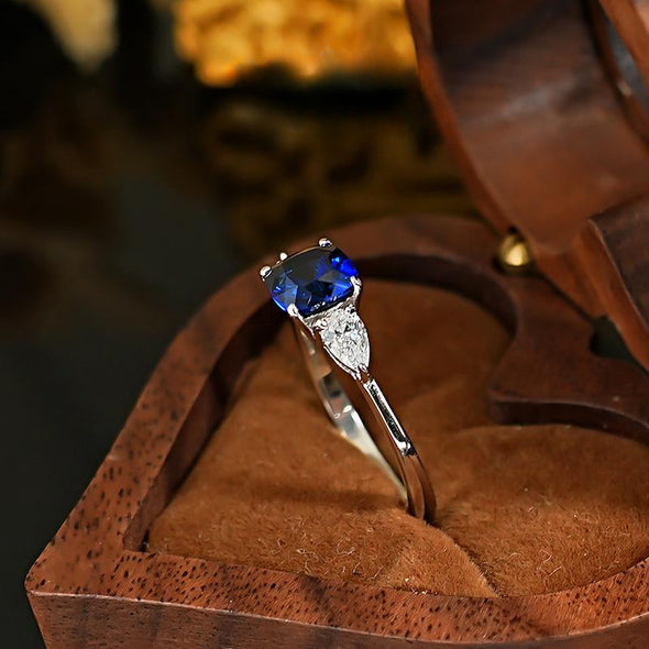 Three Stone Blue Cushion Cut Sterling Silver Engagement Ring