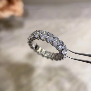 Oval Cut Eternity Sterling Silver Wedding Band