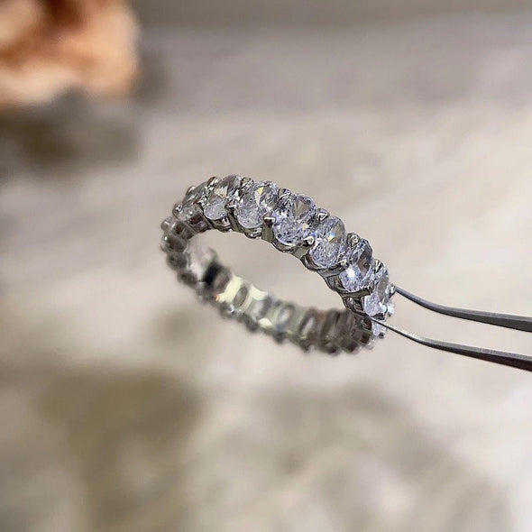 Oval Cut Eternity Sterling Silver Wedding Band