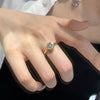 Simple Round Cut Golden Tone Engagement Ring