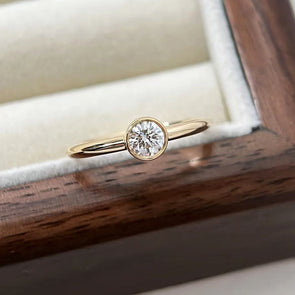 Simple Round Cut Golden Tone Engagement Ring