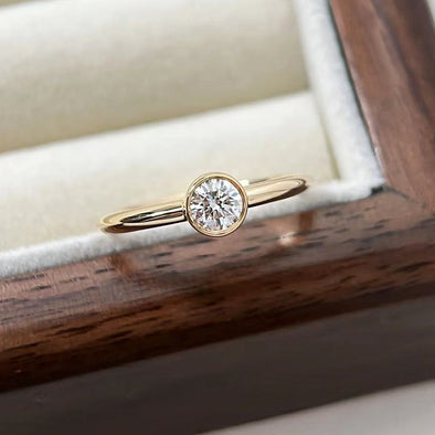 Simple Round Cut Golden Tone Engagement Ring