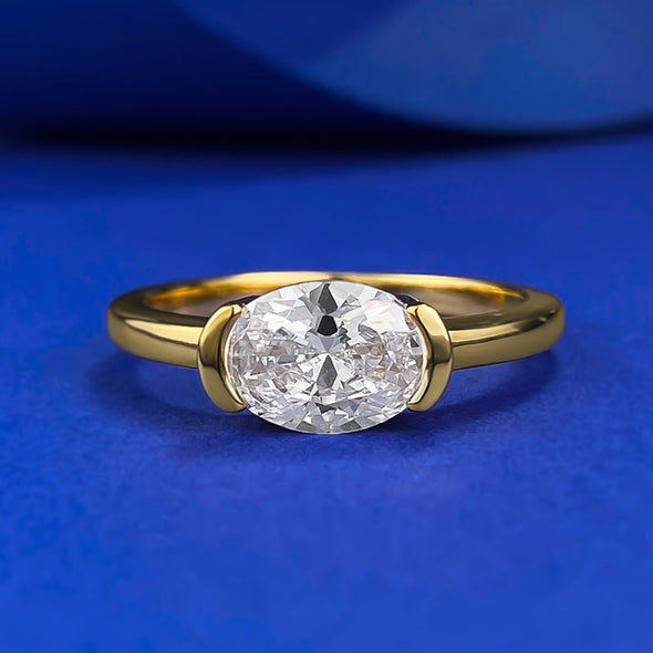 Exquisite Oval Cut Golden Tone Engagement Ring in Sterling Silver