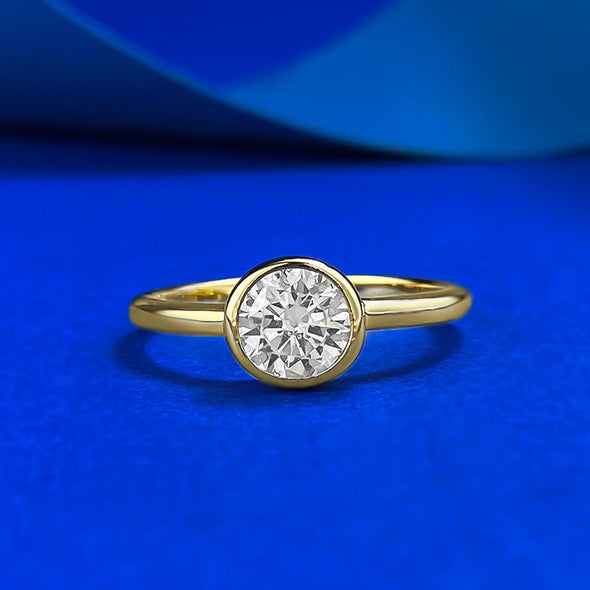 Simple Round Cut Golden Tone Engagement Ring