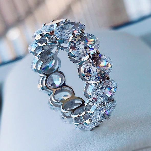 Stunning Oval Cut Eternity Sterling Silver Wedding Band