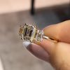 Stunning Golden Tone Emerald Cut Three Stone Engagement Ring In Sterling Silver