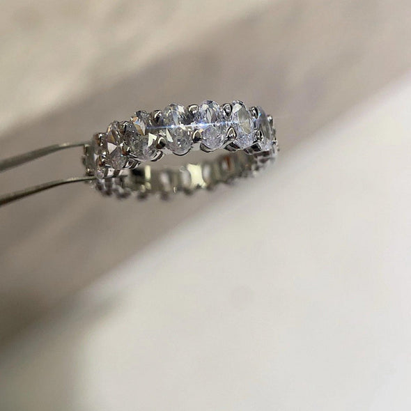 Oval Cut Eternity Sterling Silver Wedding Band