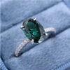 Classic Oval Cut Emerald Green Engagement Ring In Sterling Silver