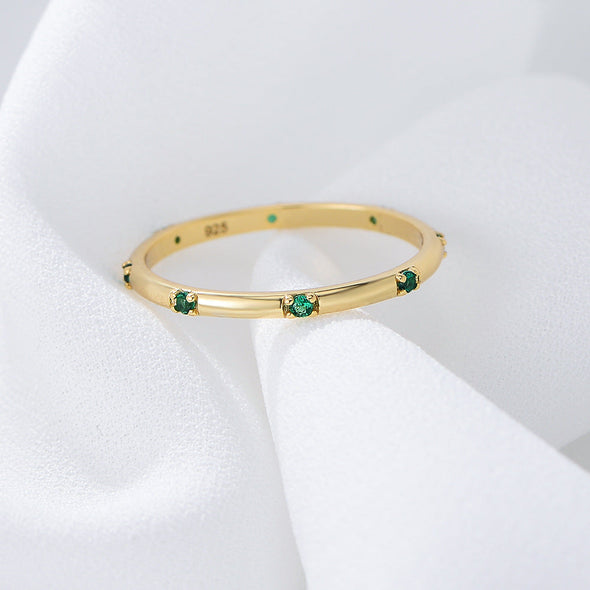 Stylish Golden Tone Wedding Band with Gemstone Accents