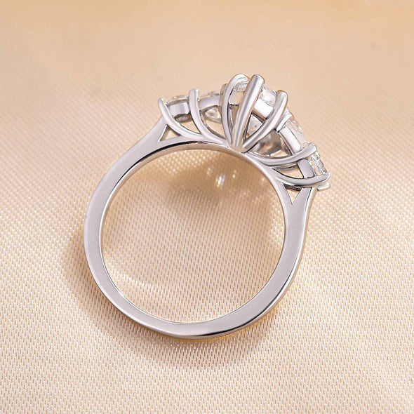 Dainty Marquise Cut Three Stone Engagement Ring In Sterling Silver
