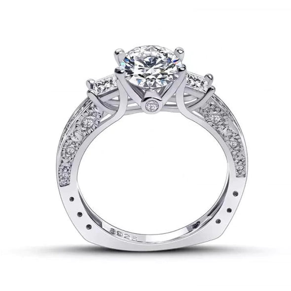Oval Cut Engagement Ring with Two Princess Sidestones