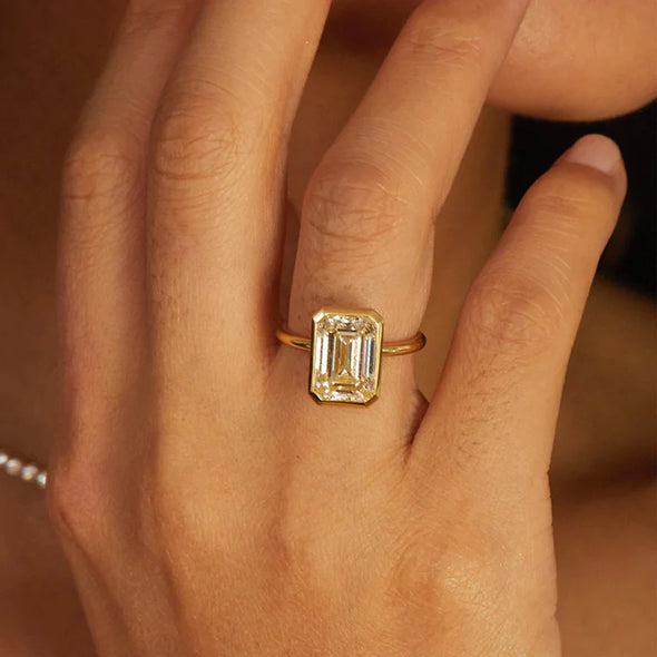 Elegant Emerald Cut Sterling Silver Engagement Ring In Golden Tone