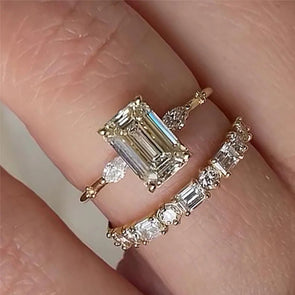 Luxurious Golden Tone Emerald Cut Three Stone Sterling Silver Bridal Set