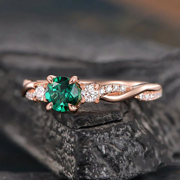 Emerald Green Twist Rose Golden Engagement Ring In Sterling Silver