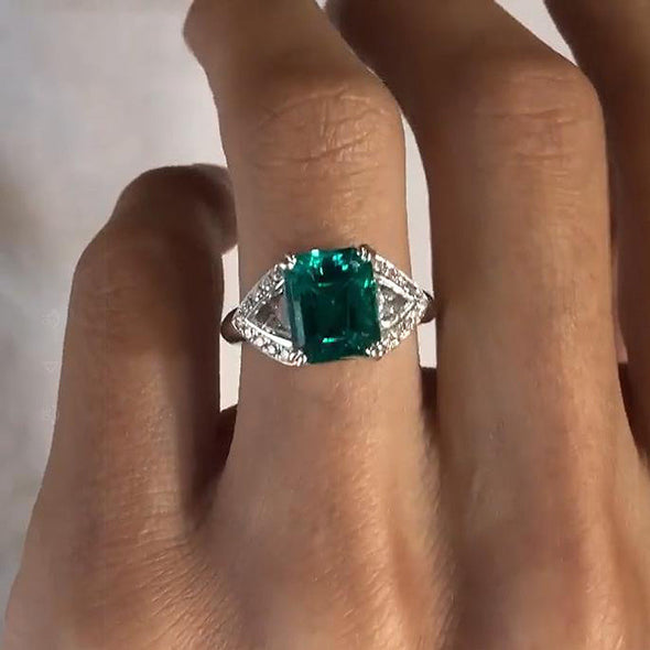 Radiant Cut Emerald GreenTapered Three Stone Sterling Silver Engagement Ring