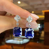 gorgeous Blue Cushion Cut Drop Earrings In Sterling Silver