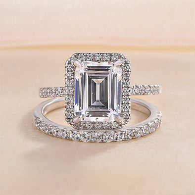 Halo Emerald Cut Sterling Silver Bridal Set with Side Stone Band